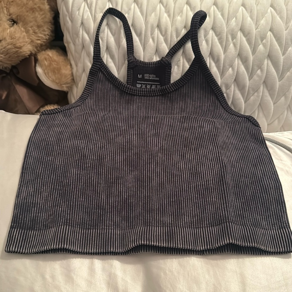 New. Never worn. Fits like a small.